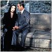 A Família Addams : foto Anjelica Huston, Raul Julia