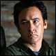 O Contrato : foto John Cusack