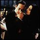 A Família Addams : foto Anjelica Huston, Raul Julia