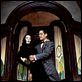 A Família Addams : foto Anjelica Huston, Raul Julia