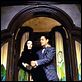 A Família Addams : foto Anjelica Huston, Raul Julia